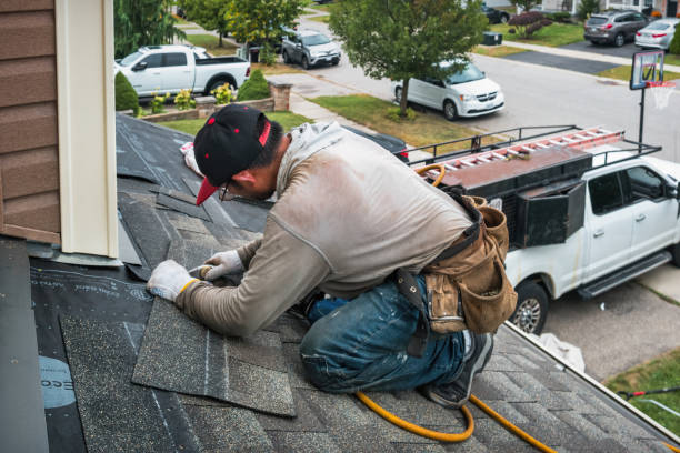 Professional Roofing technician working in Oakwood, OK